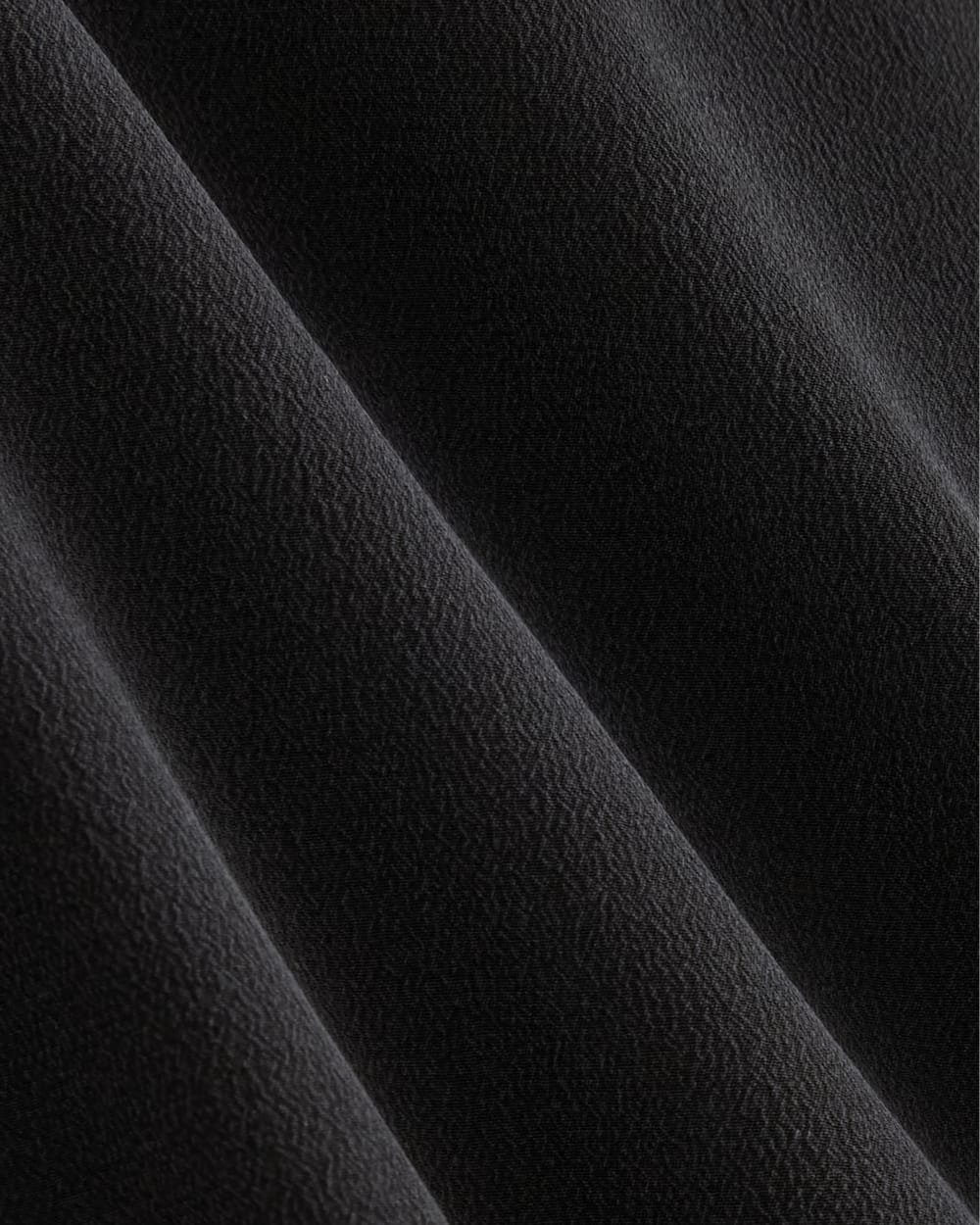 The Popover Top in Washable Silk in Black — detail view