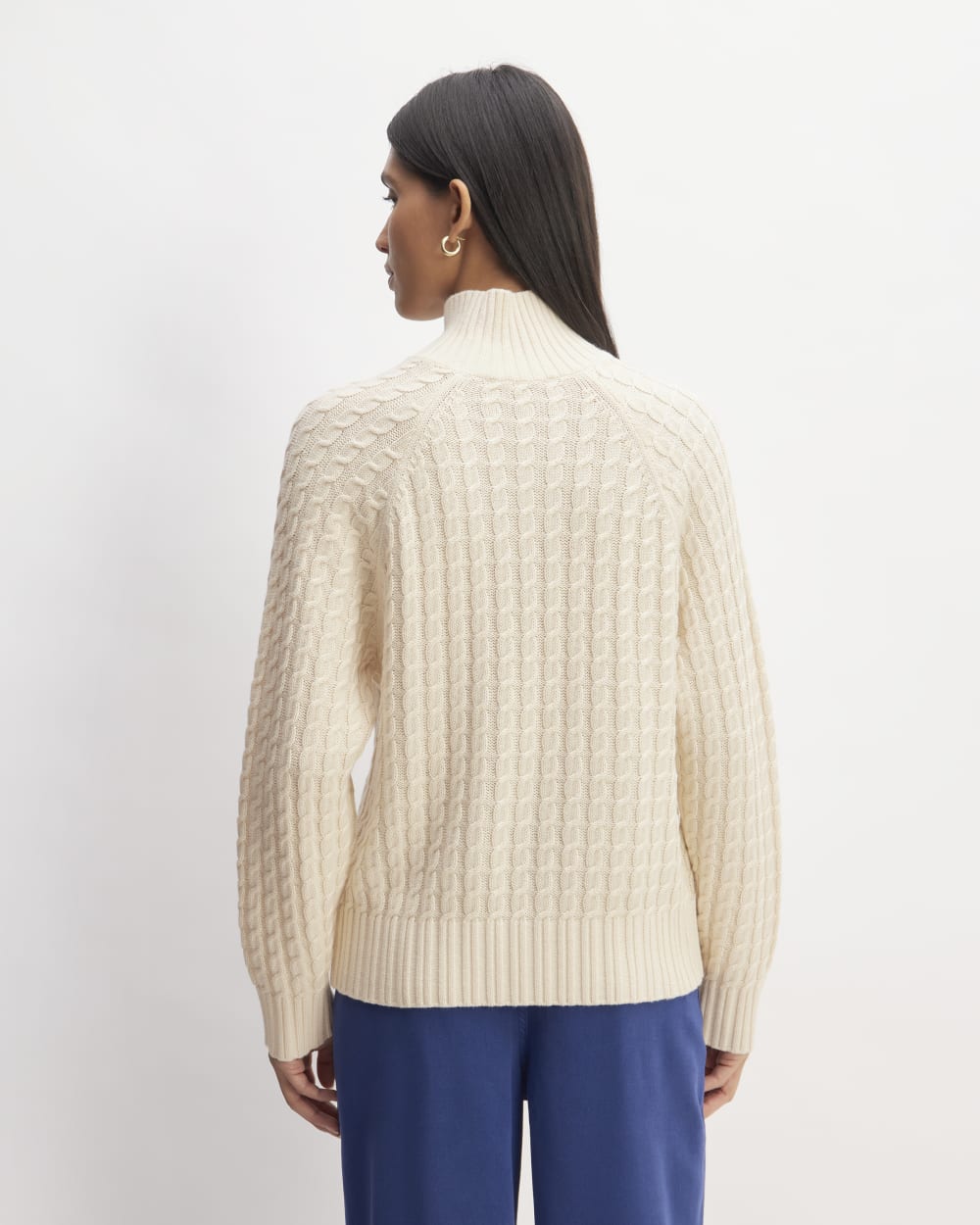 The Cotton Merino Cable Turtleneck in Canvas — detail view