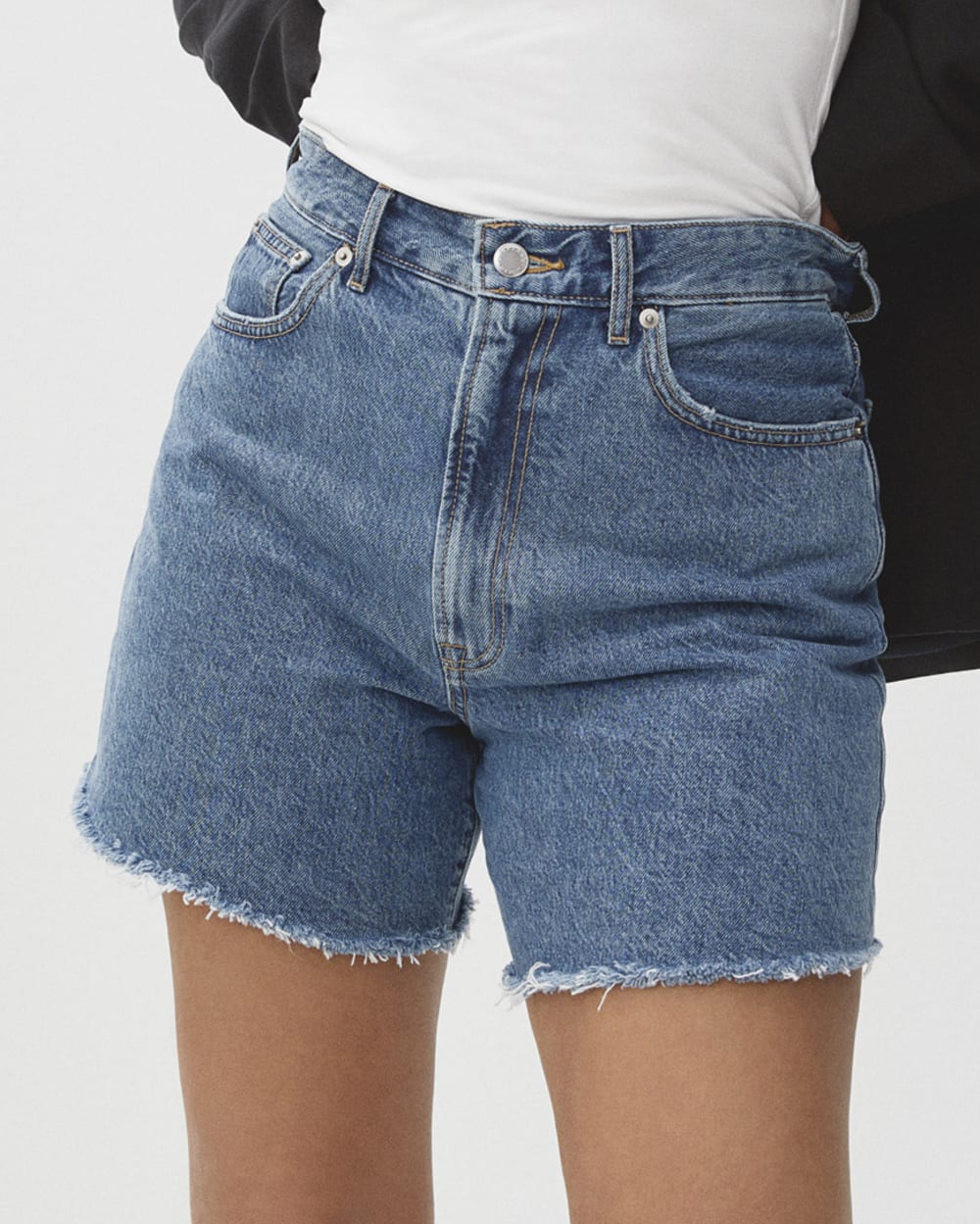 The A-Line Denim Short in Medium Indigo — detail view