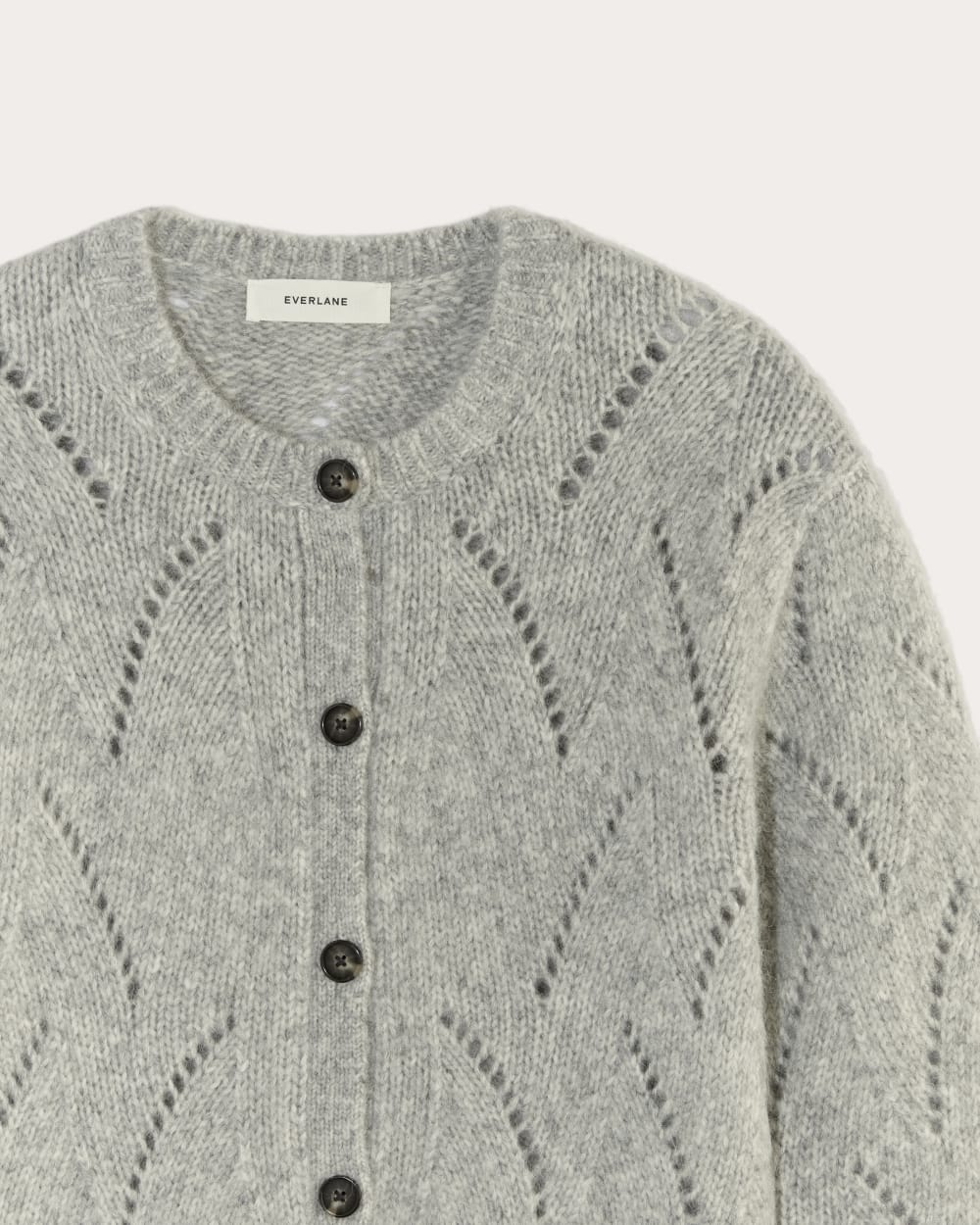 The Pointelle Cardigan in Cloud in Heather Grey — detail view
