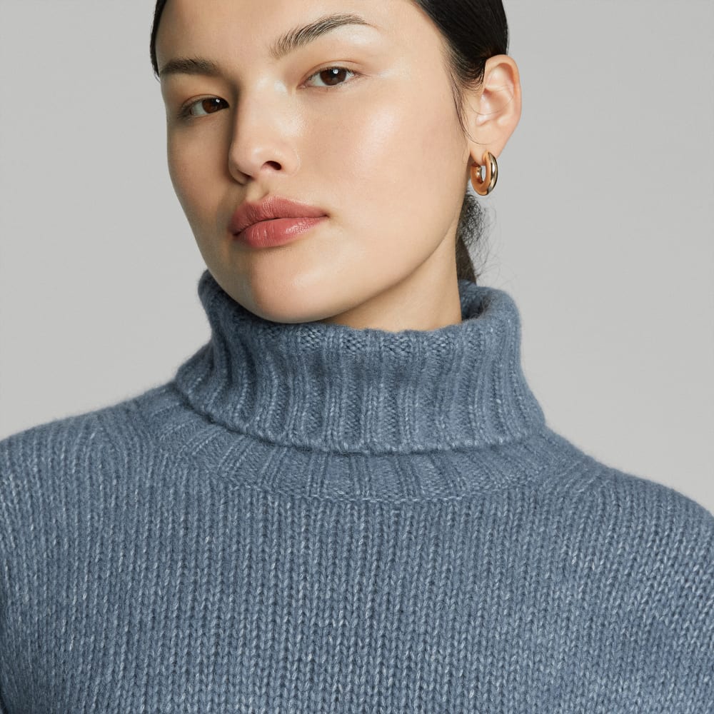 The Cloud Turtleneck in Faded Blue — detail view