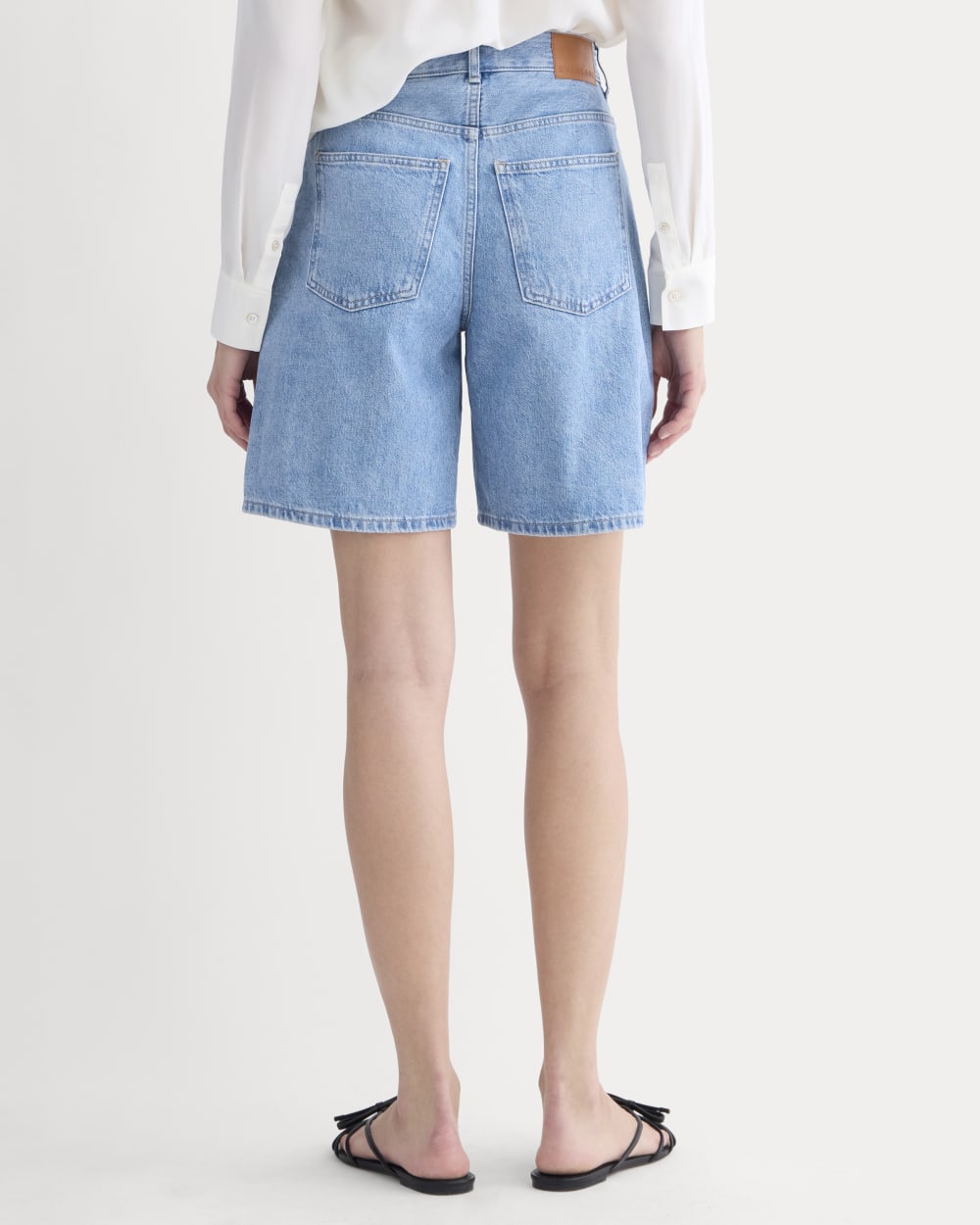 The Long A-Line Denim Short in Light Indigo — detail view