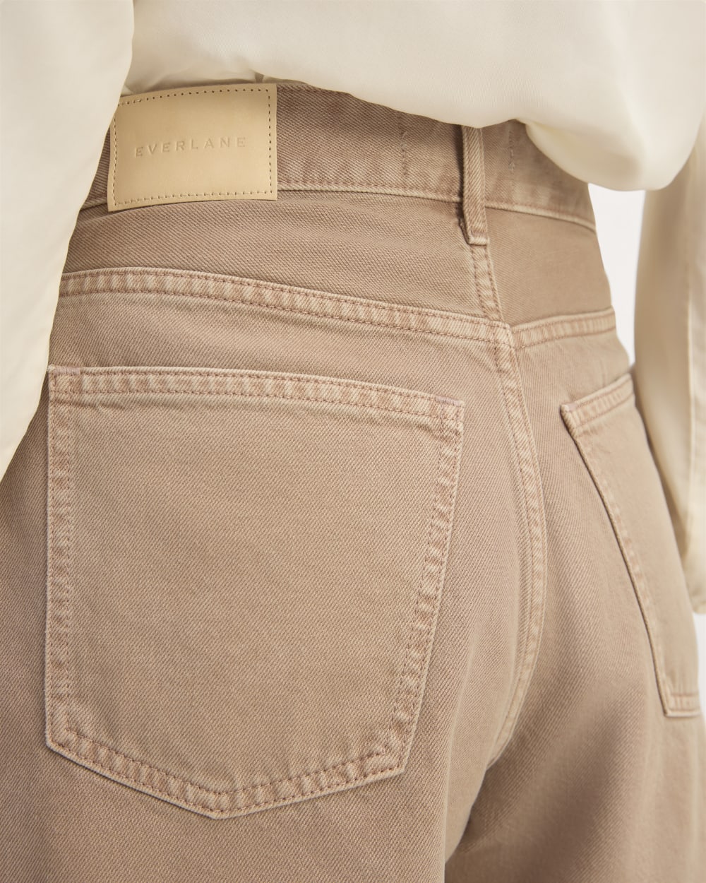 The A-Line Denim Short in Neutral Chanterelle — detail view