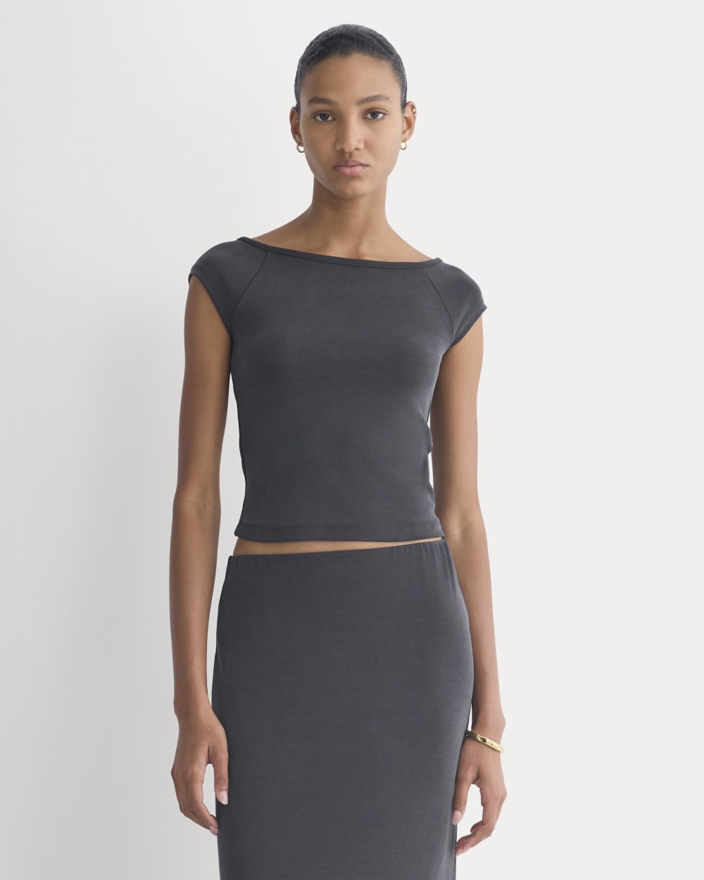 Boatneck Cap-Sleeve Top in Butterknit in Black — front view
