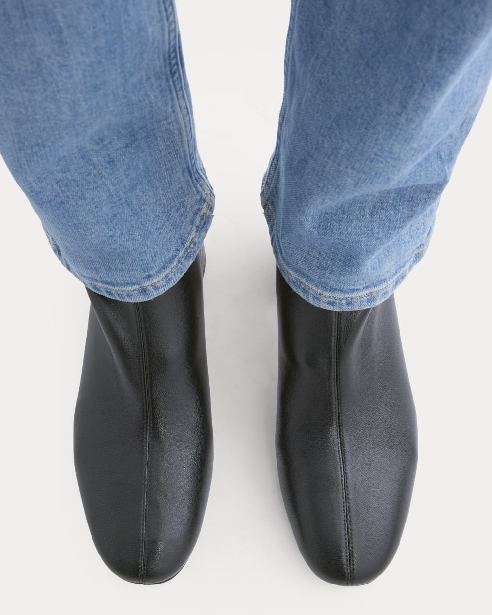 Leather Curved-Heel Boot in Black — detail view