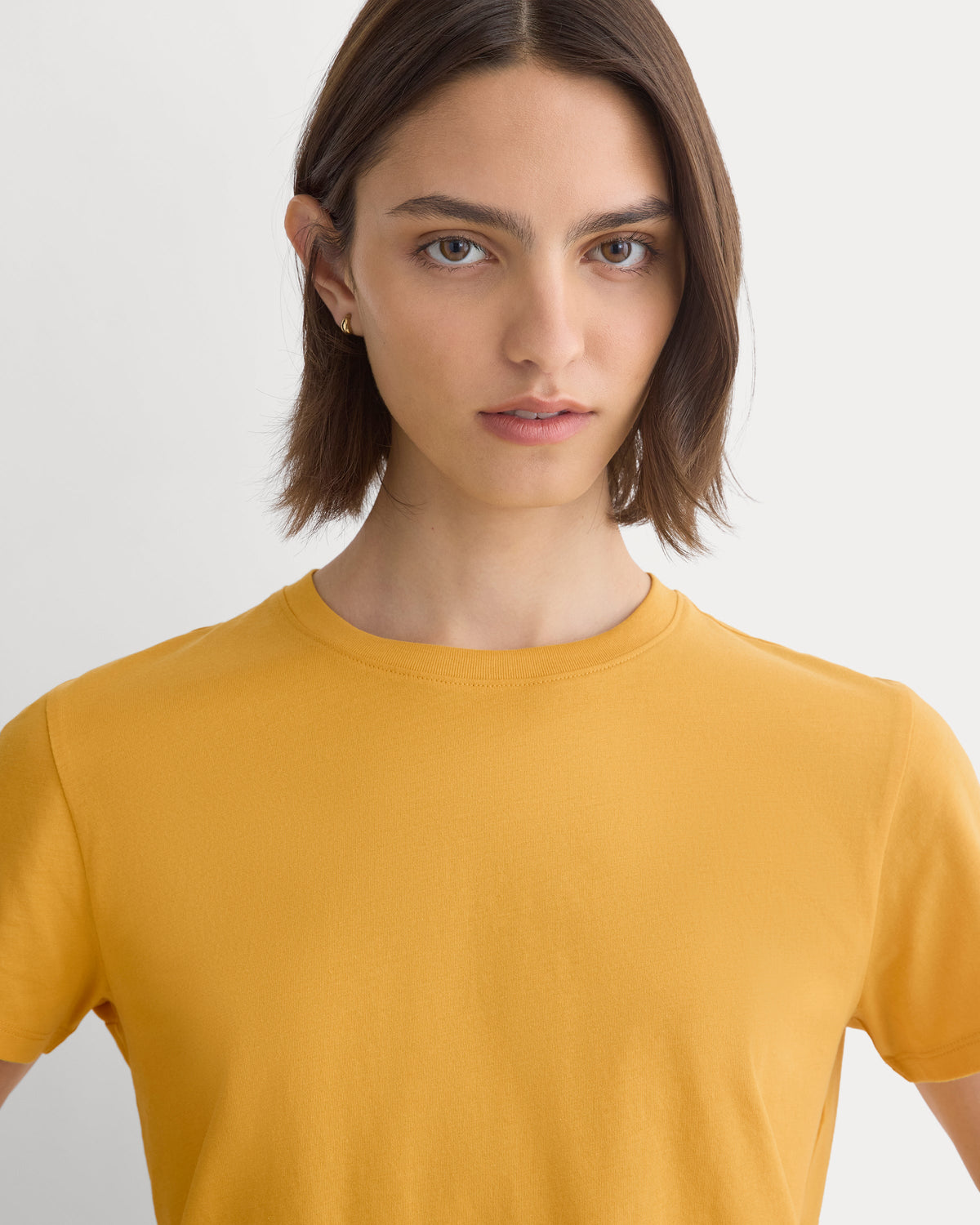 The Box-Cut Tee in Essential Cotton in Golden Glow — detail view