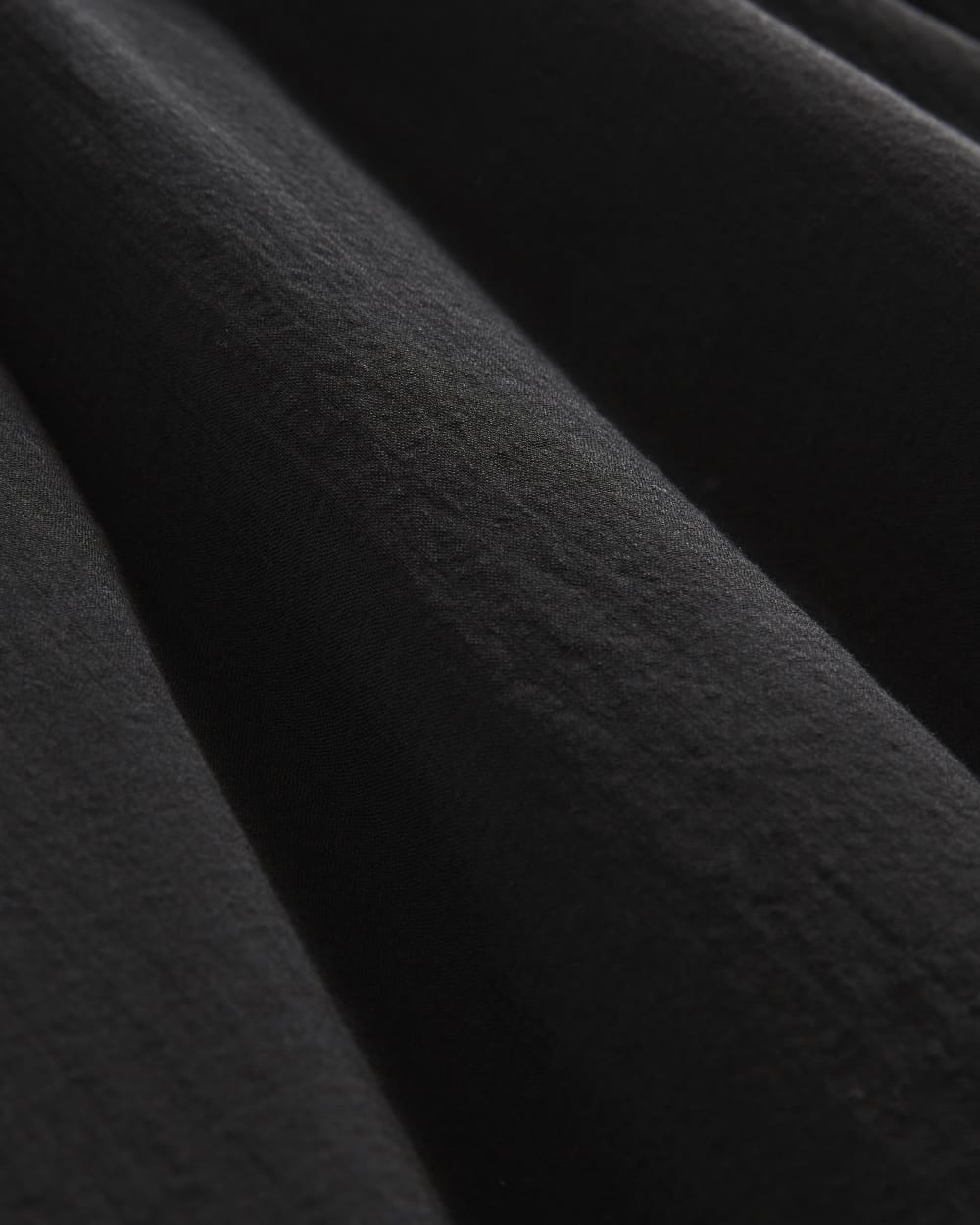 The Gauze Tiered Skirt in Black — detail view