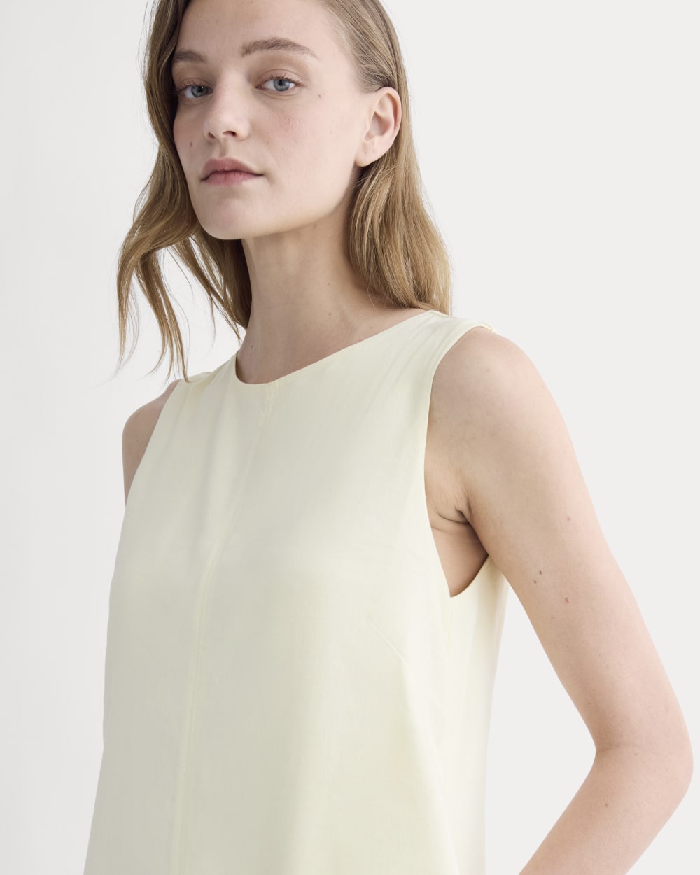 The Shift Dress in Stretch Linen in Light Yellow — detail view