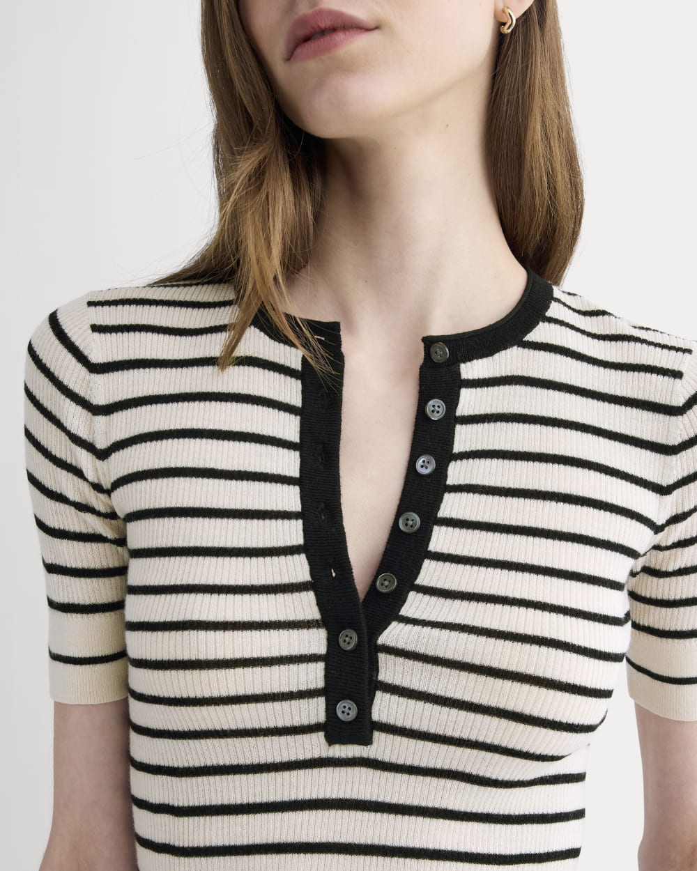 The Short-Sleeve Henley in Ultrasoft Merino in Parchment / Black — detail view