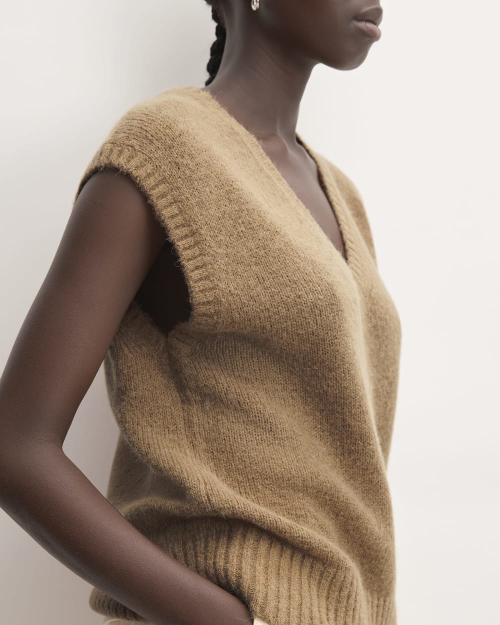 The Alpaca V-Neck Vest in Tiger's Eye — detail view