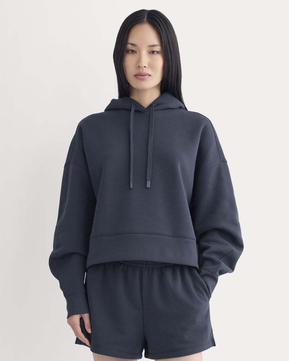 Cropped Luxe Fleece Hoodie in Navy — front view
