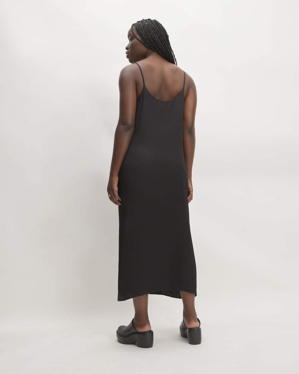 The Hammered Satin Slip Dress in Black — detail view