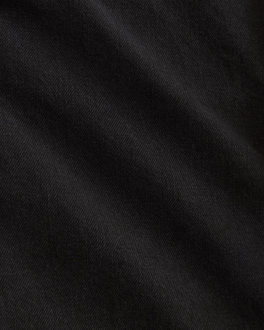 The OG Baggy Jean Short in Washed Black — detail view