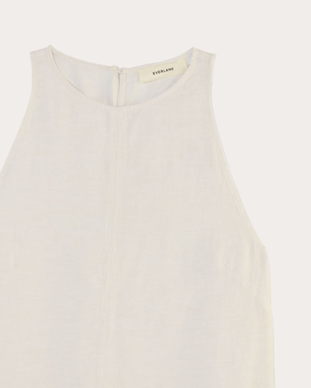 The Linen High-Neck Tank in Natural Chambray — detail view