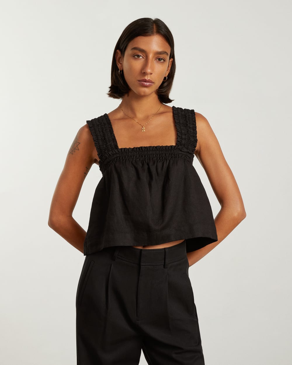 The Smocked Linen Cami in Black — detail view
