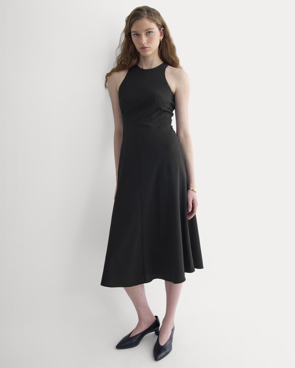 Sleeveless Seamed Dress in Black — front view