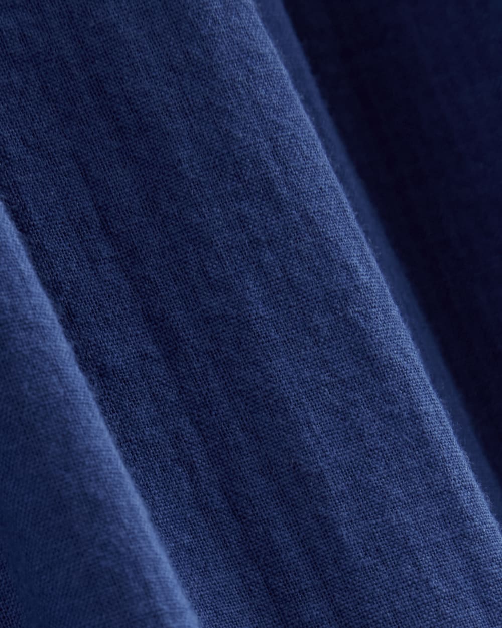 The Gauze Smock Dress in Mazarine Blue — detail view