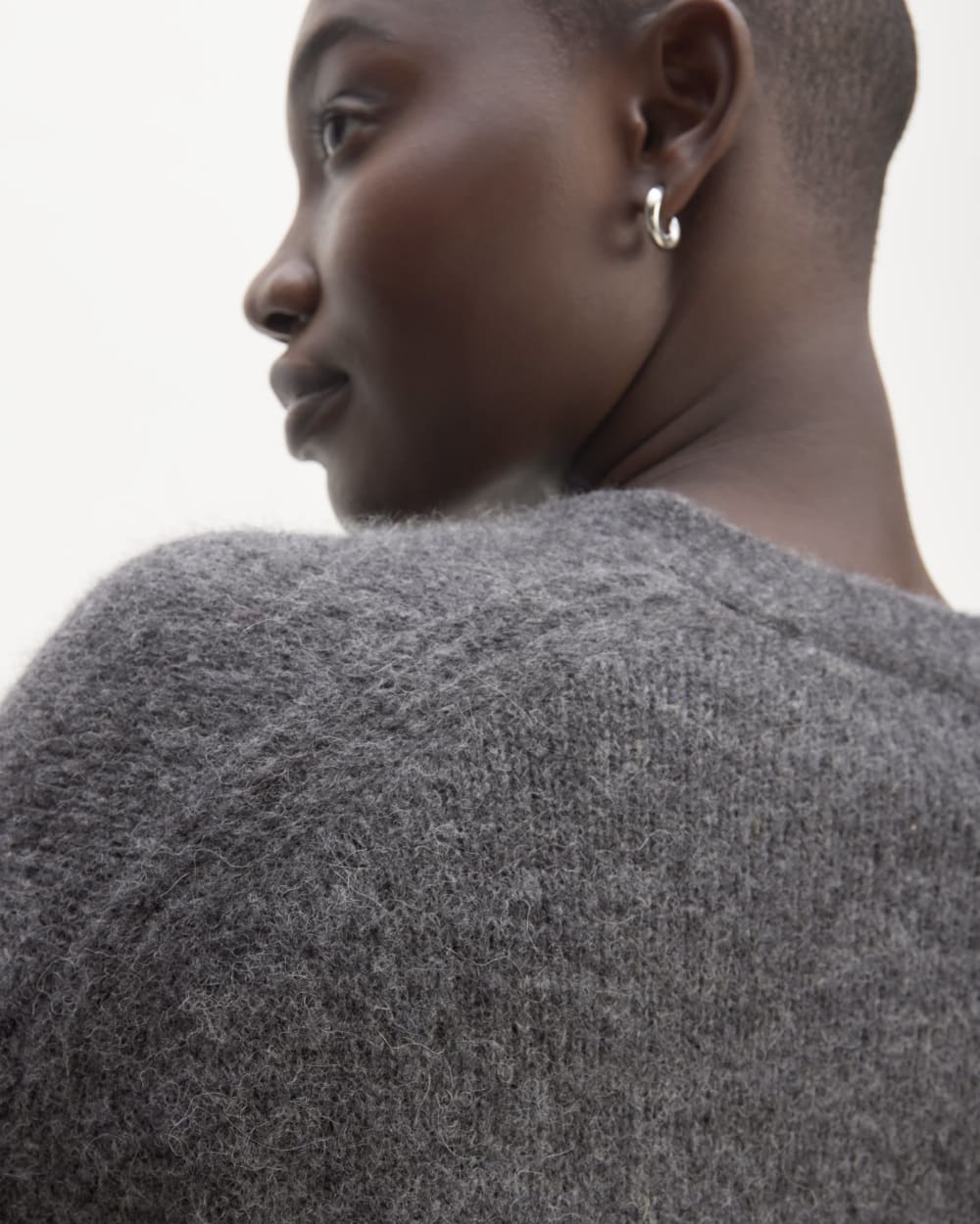 The Alpaca V-Neck Cropped Cardigan in Dark Charcoal — detail view