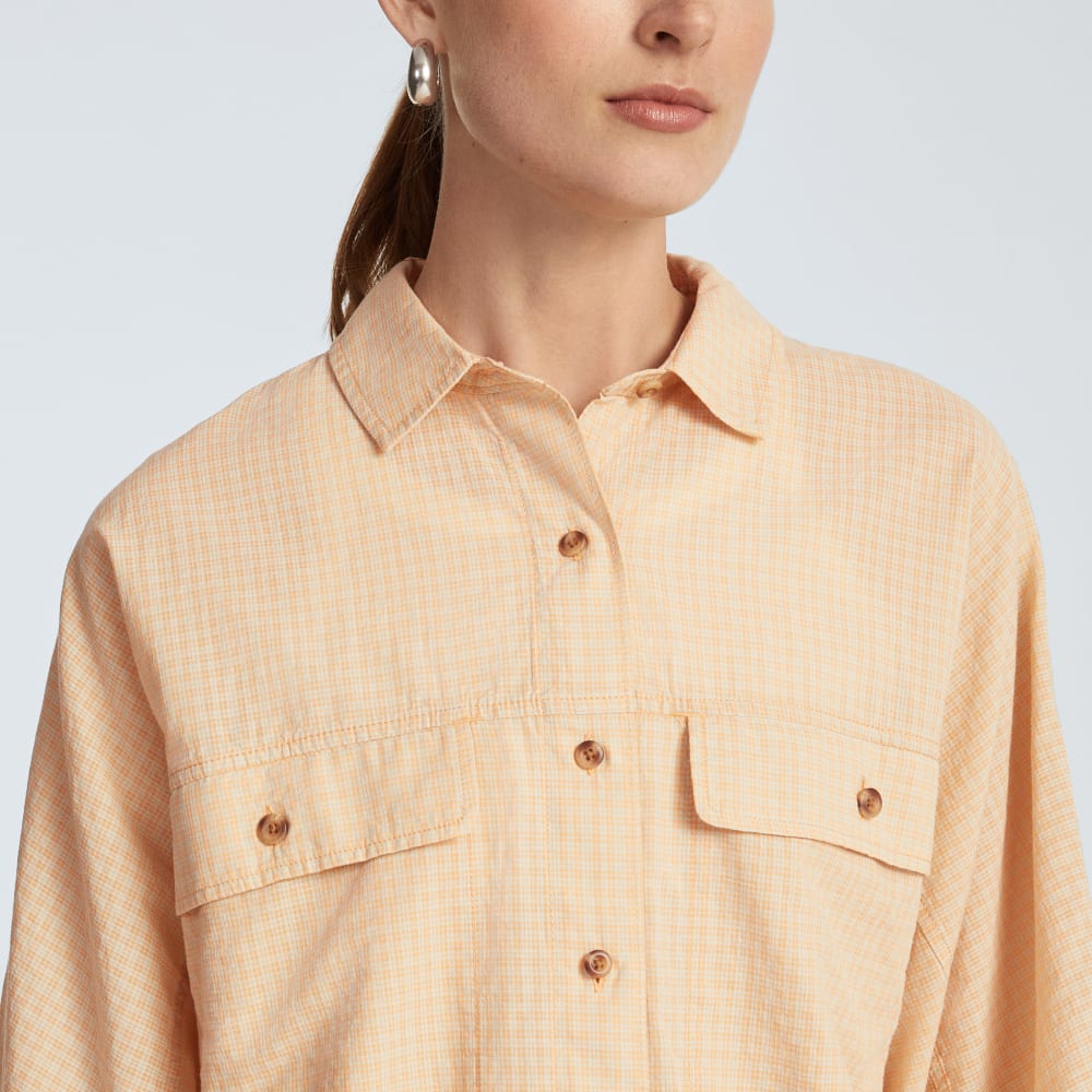 The Cotton Tourist Shirt in Orange Plaid — detail view