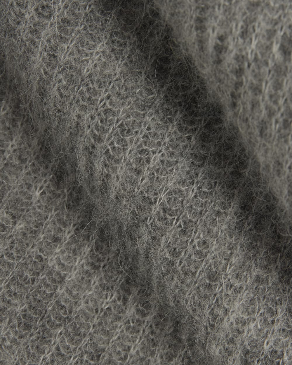 The Oversized Polo in Alpaca in Heather Stone Grey — detail view