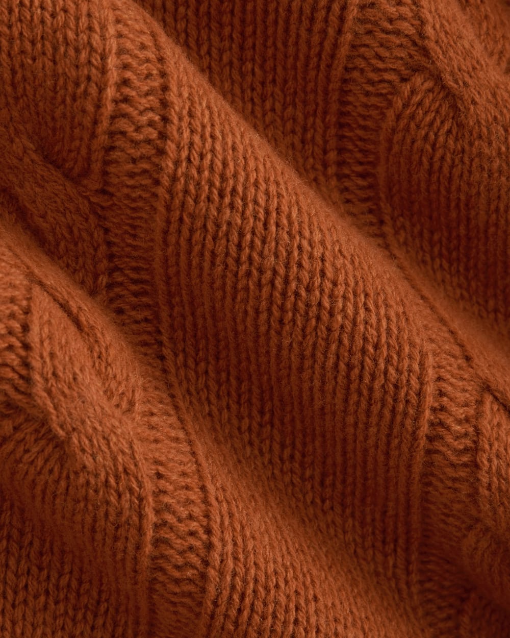 Cable Cardigan in Extrafine Luxe Merino in Rust Heather — detail view