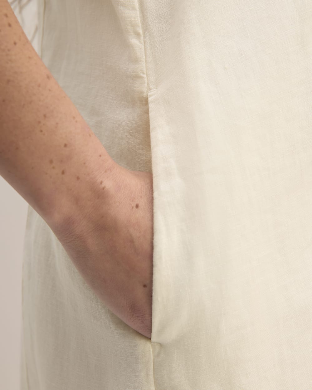 The Linen V-Neck Midi Dress in Bone — detail view
