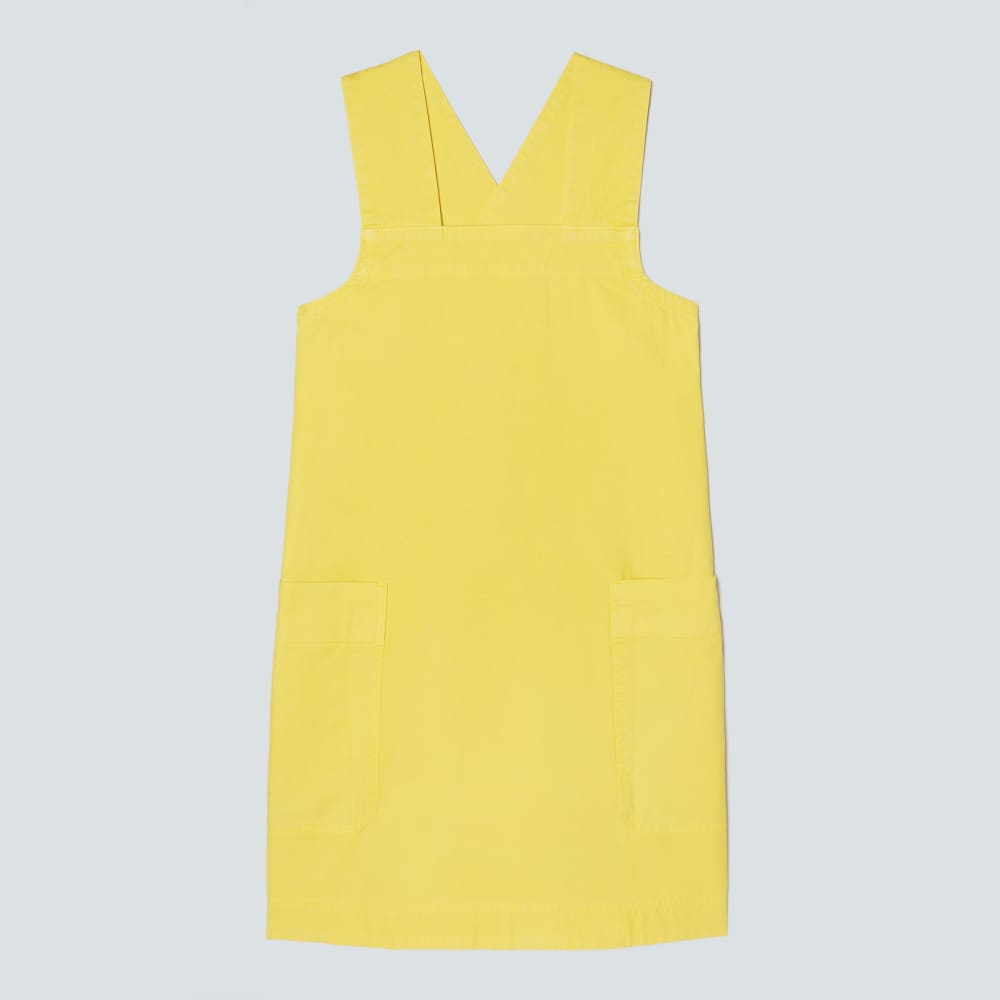 The Cross-Back Apron Mini Dress in Lemon — front view