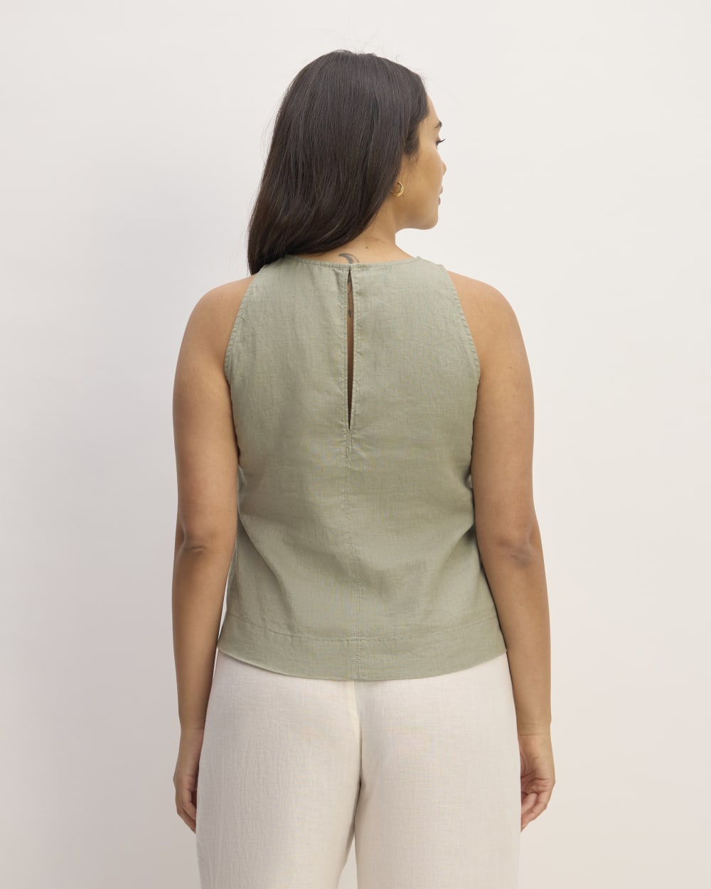 The Linen High-Neck Tank in Sage Green — detail view
