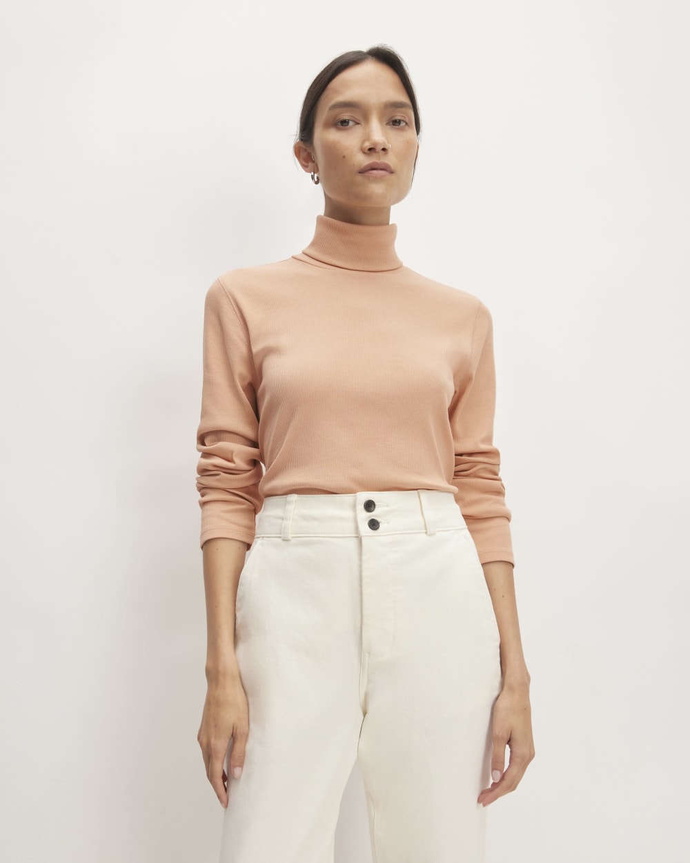 The Luxe Rib Turtleneck in Blush Pink — front view