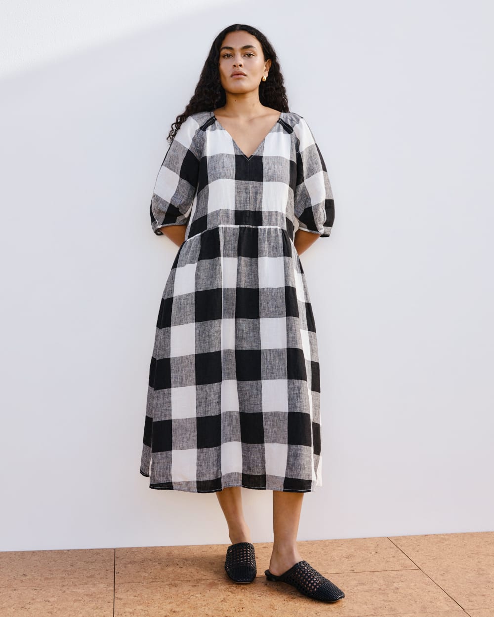 The Linen Oversized Puff-Sleeve Dress in Bone / Black Check — detail view