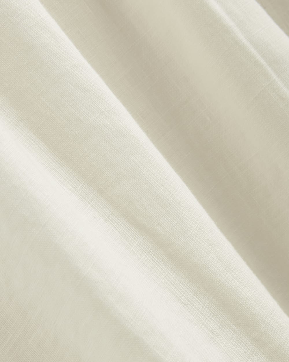 The Linen Oversized Puff-Sleeve Dress in Bone — detail view