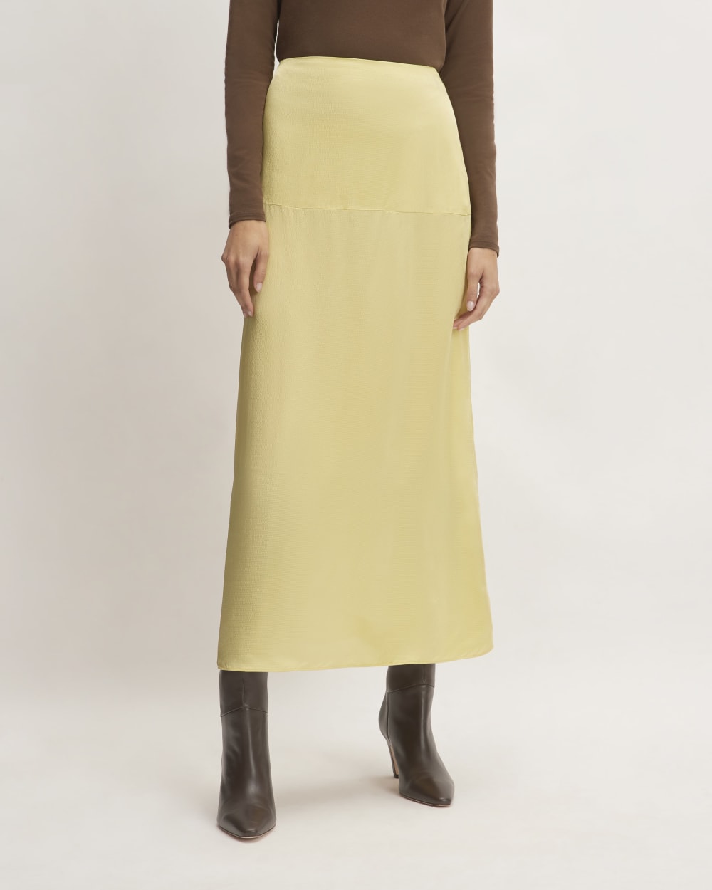 The Hammered Satin Slip Skirt in Raffia — detail view