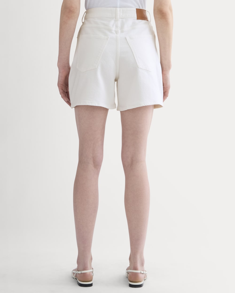 The A-Line Denim Short in White — detail view