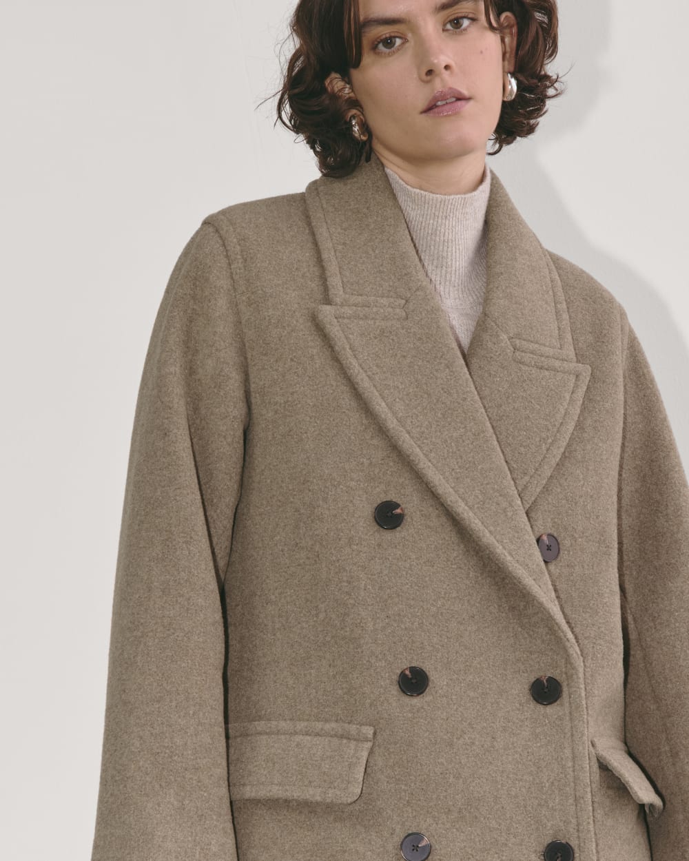 The Double-Breasted Coat in Wool in Heather Taupe — detail view