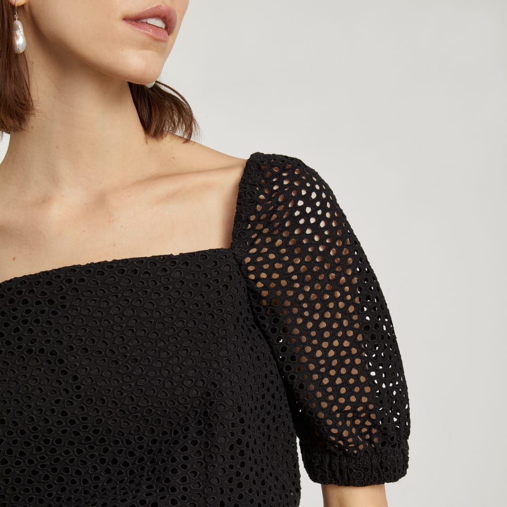 The Eyelet Puff Sleeve Top in Black — detail view