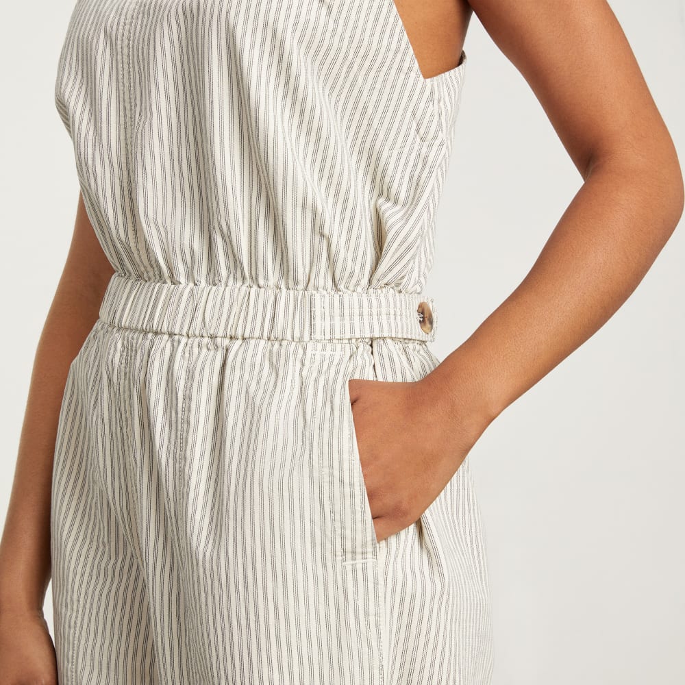 The Fatigue Apron Jumpsuit in Navy Stripe — detail view