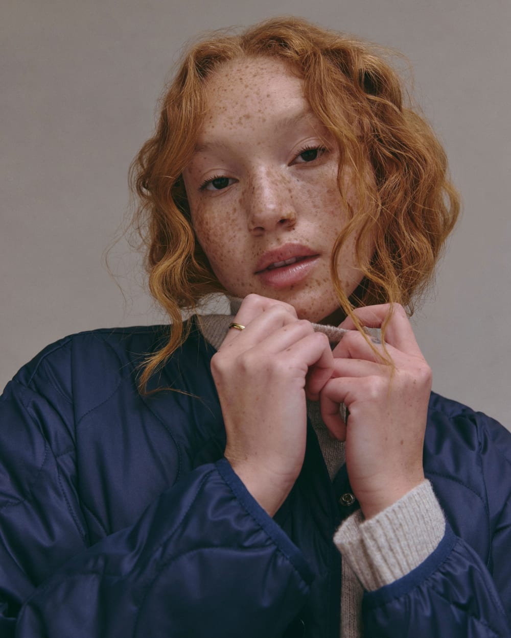 The Long Quilted Liner in Navy — detail view