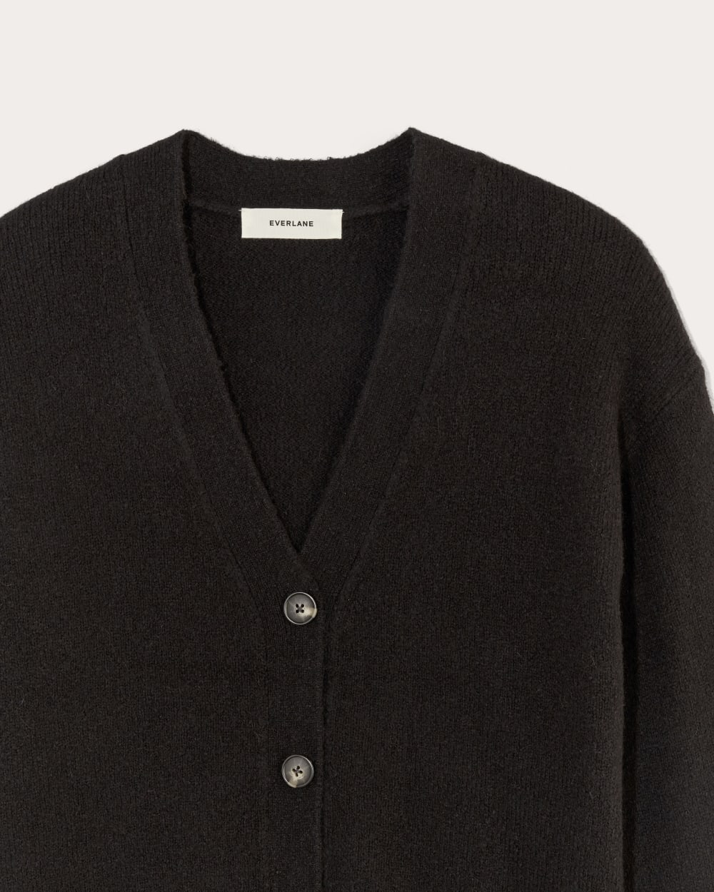The Cocoon Cardigan in Plush Cotton in Black — detail view