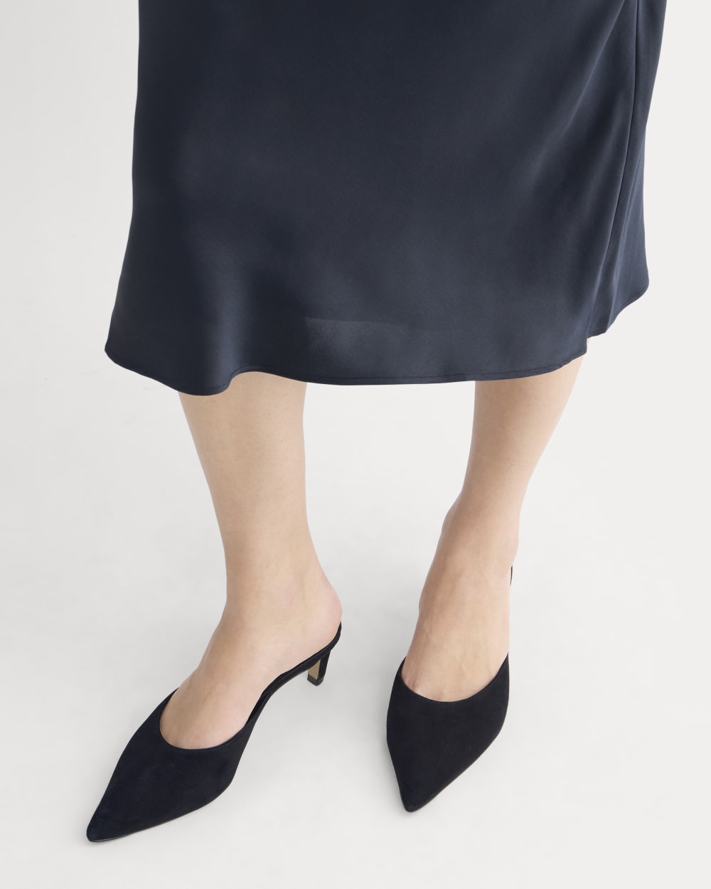 Slip Skirt in Silk Charmeuse in Navy — detail view