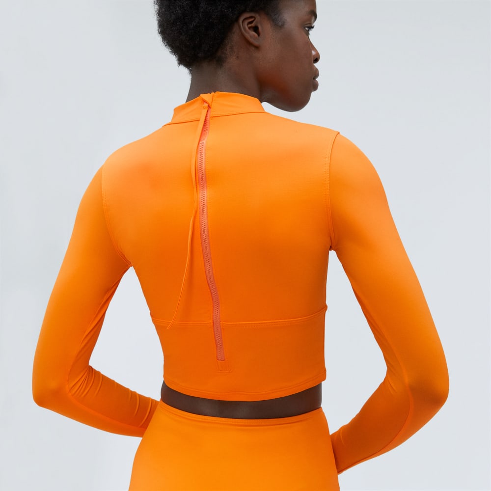 The Long Sleeve Rash Guard in Turmeric — detail view