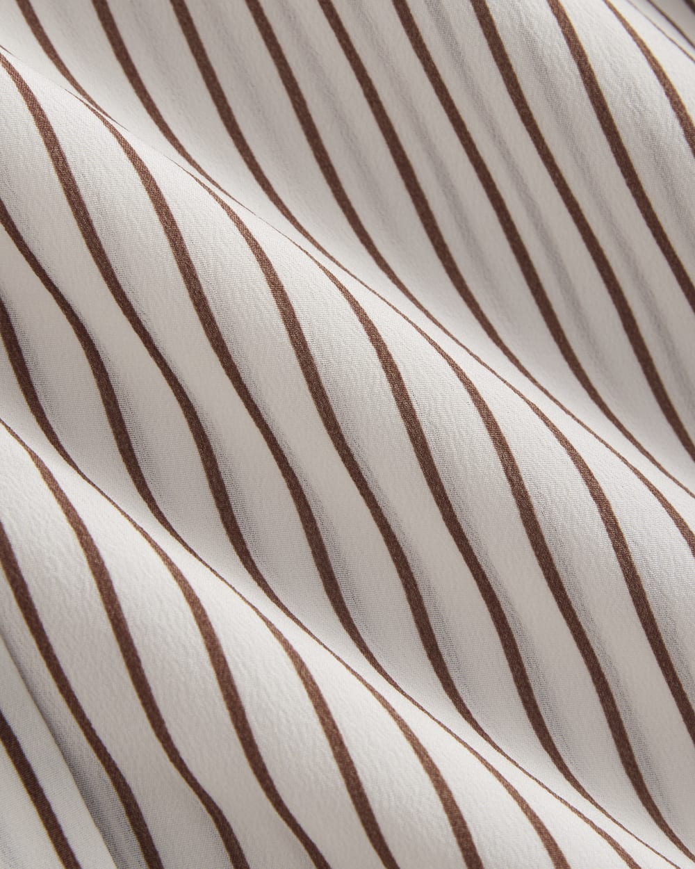 The Boxy Shirt in Washable Silk in Bone / Toffee Stripe — detail view
