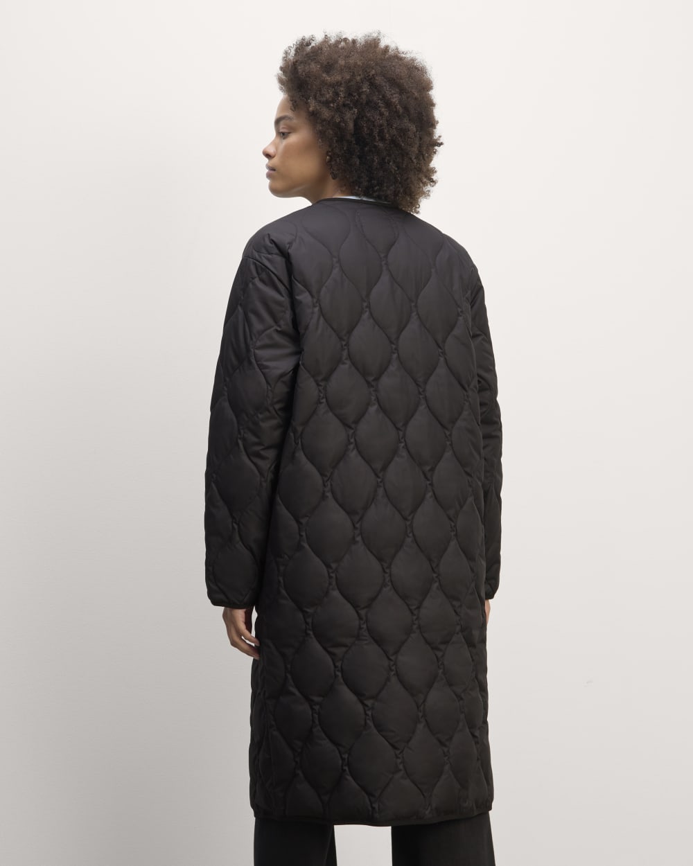 The Long Quilted Liner in Black — detail view