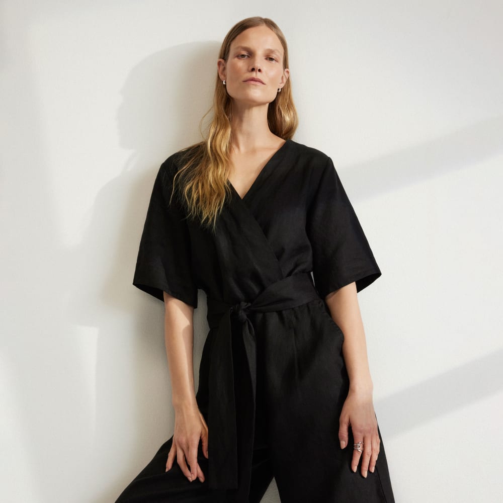 The Wrap Jumpsuit in Linen in Black — detail view