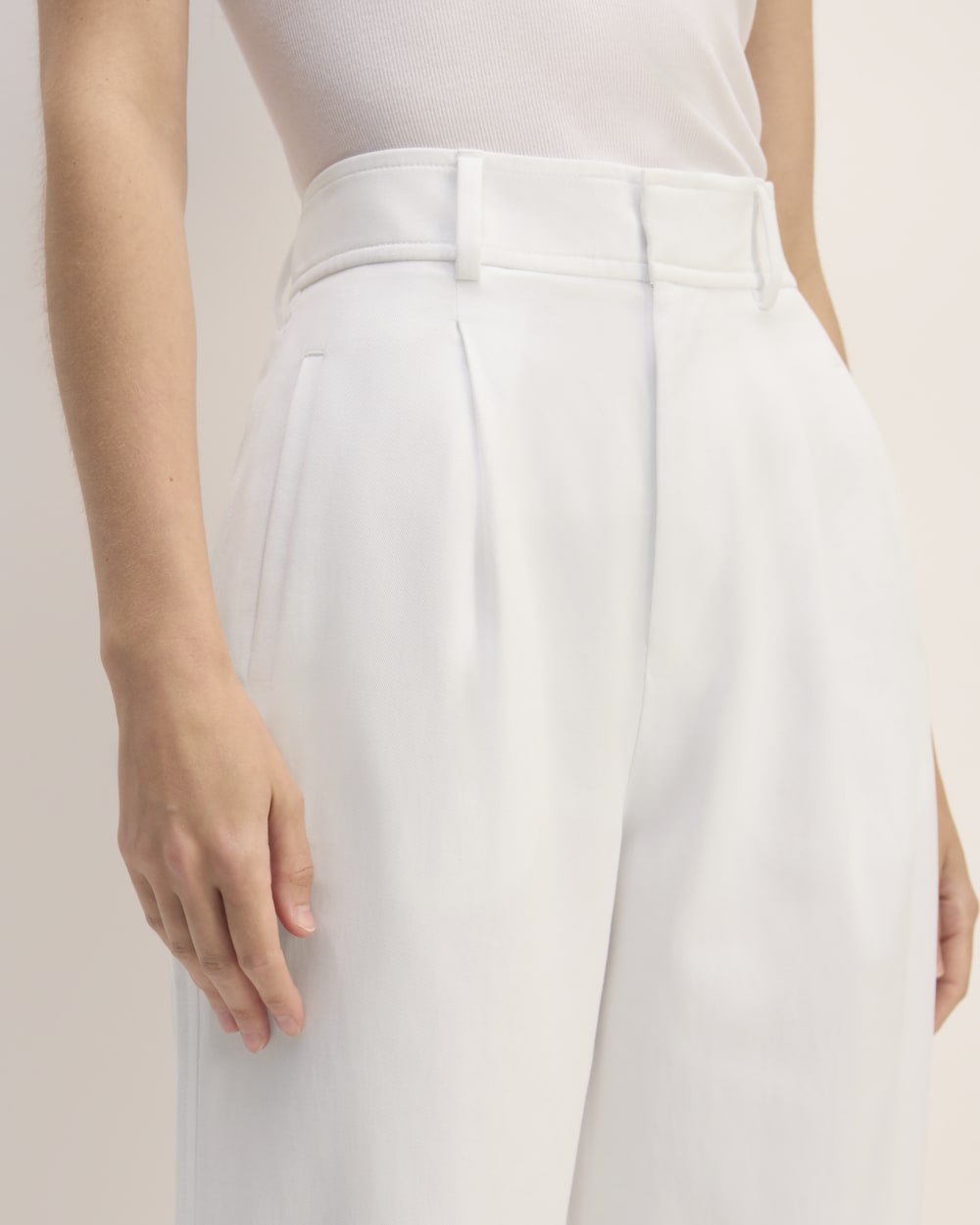 The Draper Pleated Pant in Buttersmooth in White — detail view