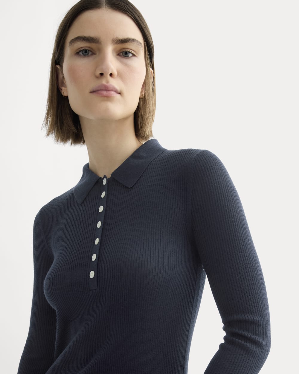 The Polo in Ultrasoft Merino in Navy — detail view