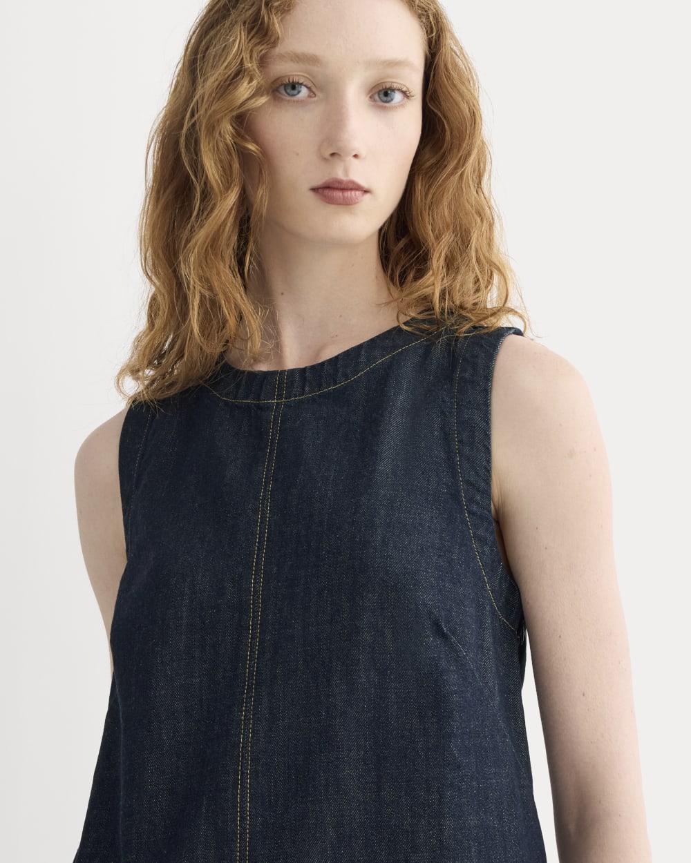 The Denim Shift Dress in Dark Indigo — detail view