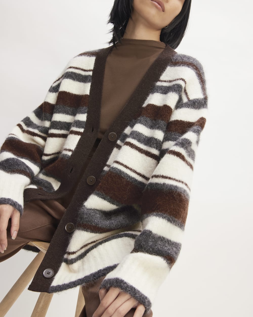 The SuperFuzz Alpaca Cardigan in Bone / Hot Fudge / Heather Charcoal — detail view