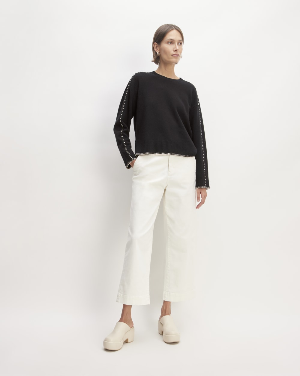 The Good Merino Wool Crewneck Sweater in Black / Buttermilk — detail view