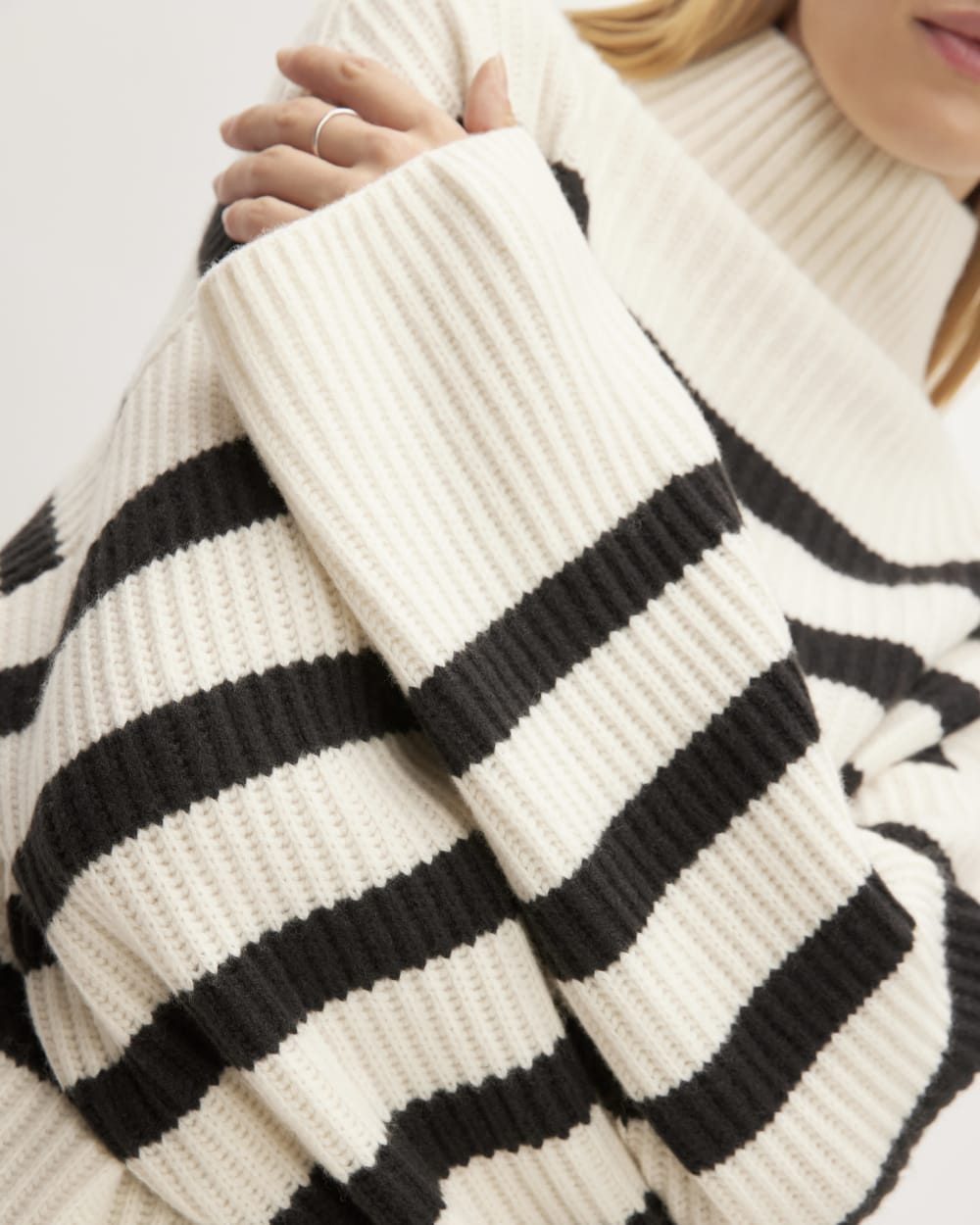 The Felted Merino Funnel-Neck Pullover in Black / Bone — detail view