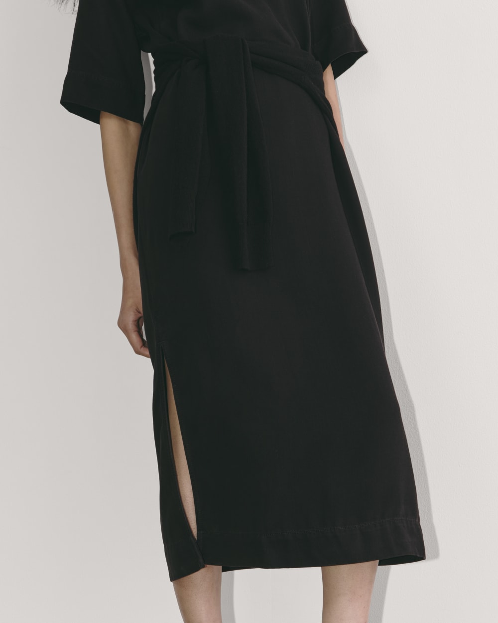 The Relaxed T-Shirt Dress in Buttersoft in Black — detail view